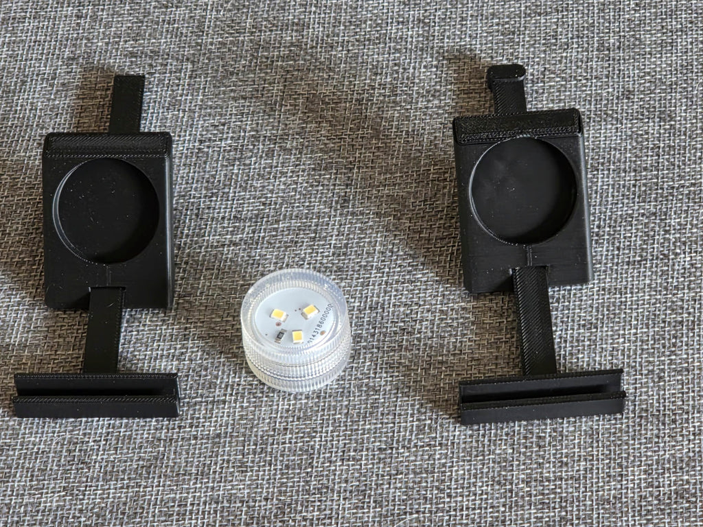 Lithophane display stand with battery-operated light