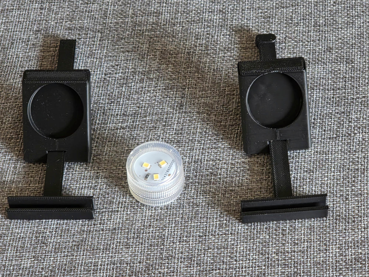 Lithophane display stand with battery-operated light